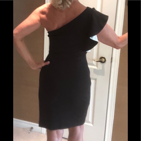 Stunning Cocktail dress with shoulder ruffle. - Picture 2 of 5